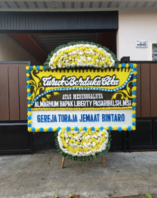 Papan Bunga Duka di Pasawahan